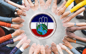 Citizenship in Society Merit Badge surrounded by hands