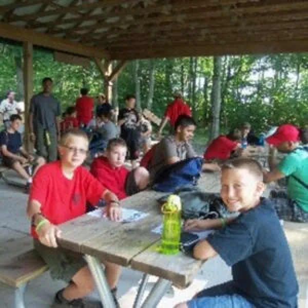 Scouts at Table under pavilion